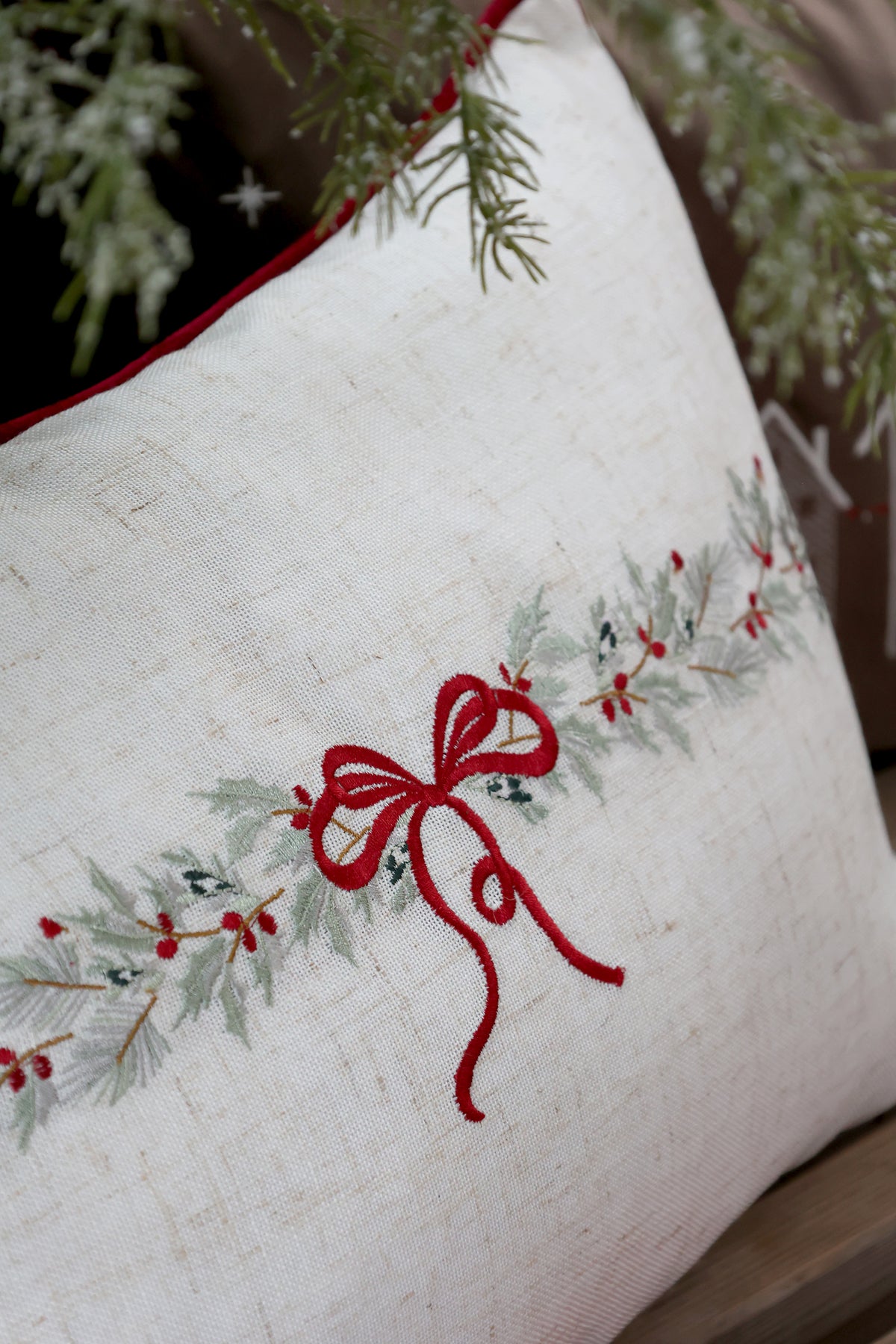 Cushion with bow & garland embroidery